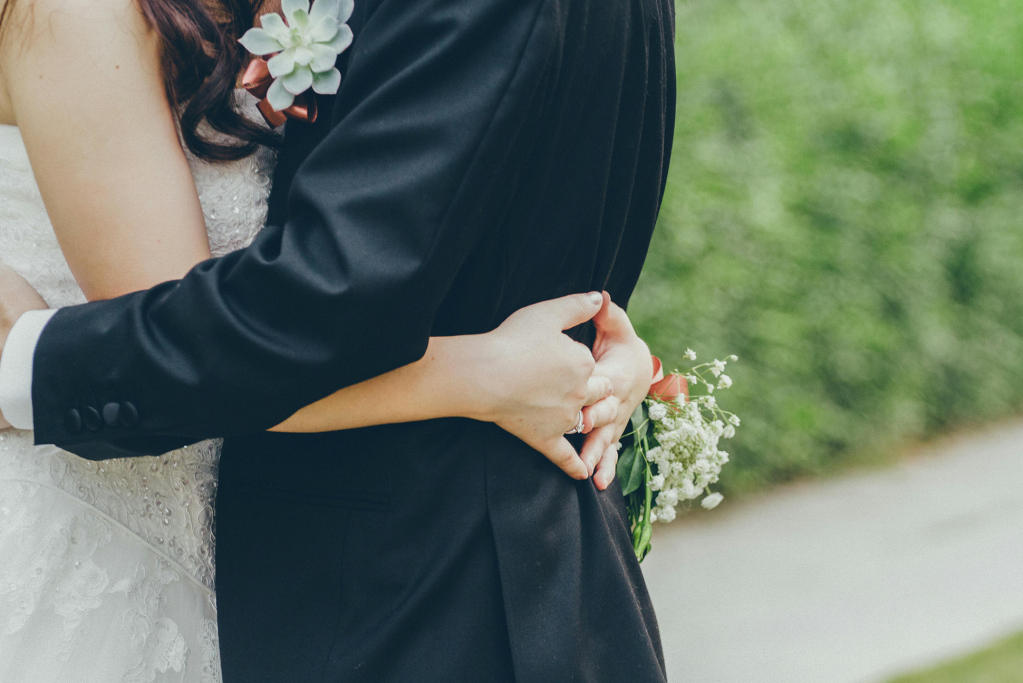 Bride and groom embracing 